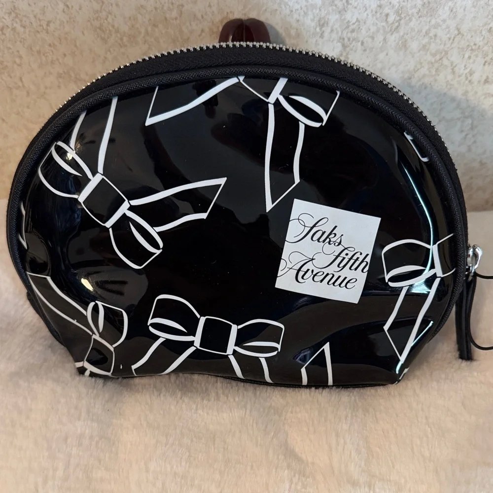 Saks Fifth Avenue Black Patent Cosmetic Pouch with White Bow Print